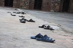 Walking With Shoes In The Mosque